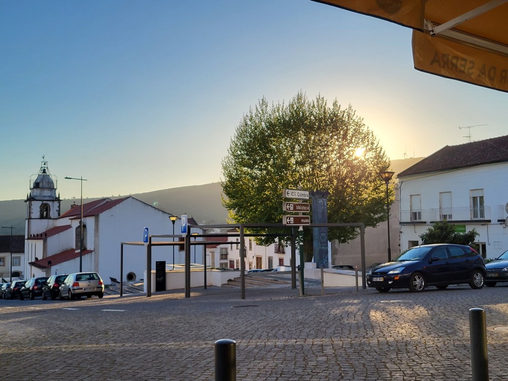 The view of the sunset in a plaza in Alvaiázere, Portugal.