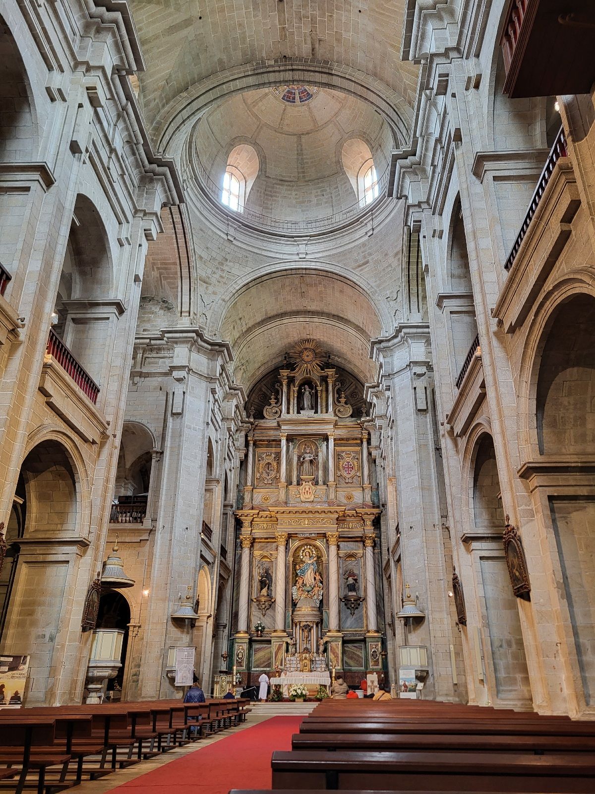 View of an altar in a large church.
