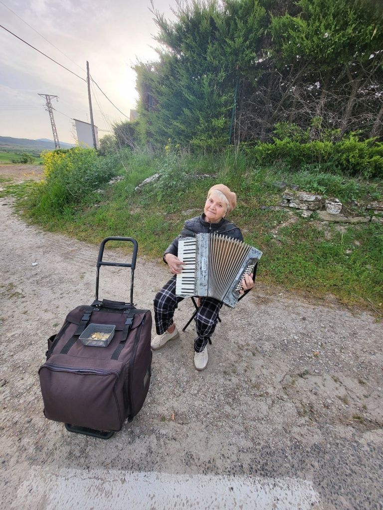 Accordion player at the edge of a village in Spain